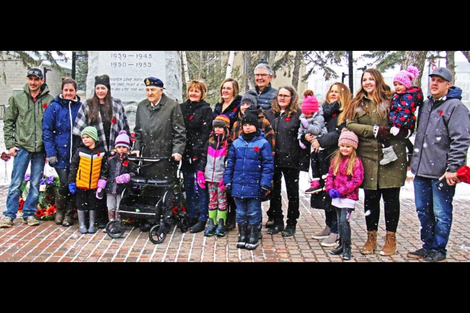 The family of Howard Schmidt gathered with him at the Weyburn cenotaph after the Remembrance Day service. The family had a special gathering with him as the public was not allowed into the Legion Hall as the service was virtual this year.