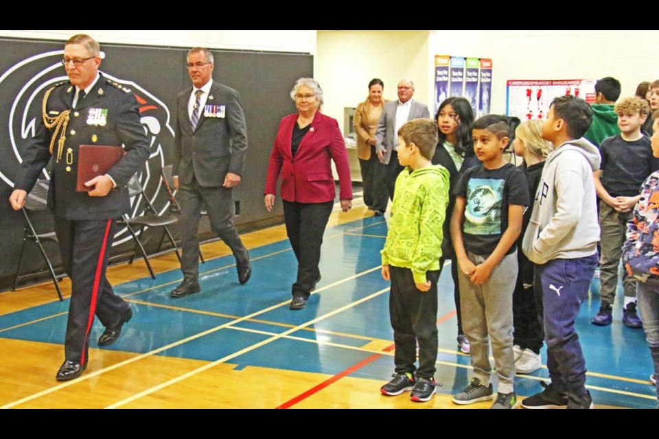 Aide-de-camp Rod Stafford led in Lt.-Gov. Russ Mirasty and his wife Donna, to a special assembly at St. Michael School on Tuesday morning where he spoke to the students.