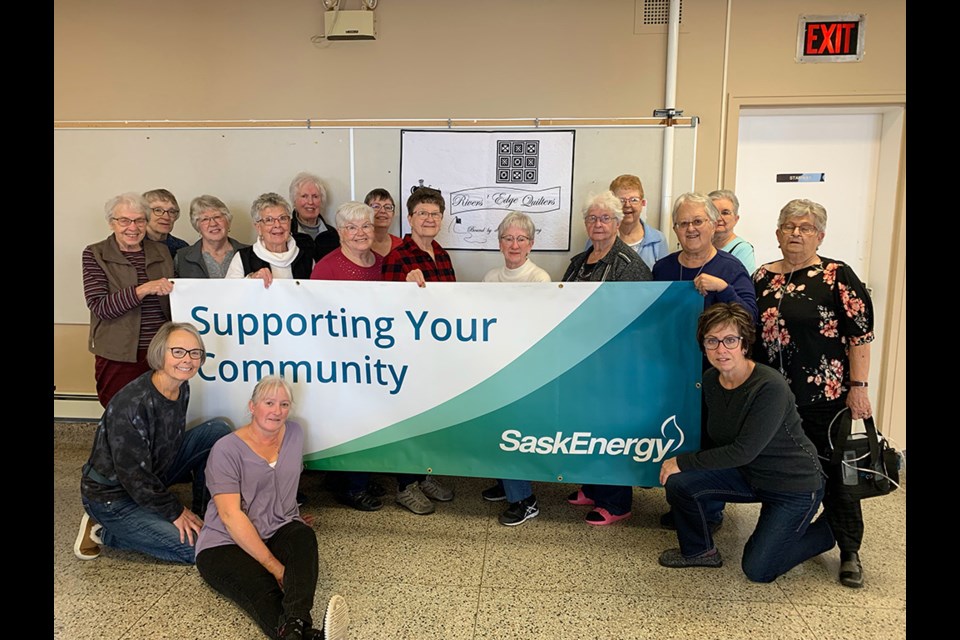 A grant from SaskEnergy will allow members of the Rivers’ Edge Quilt Guild to continue distributing quilts and other items to community organizations.