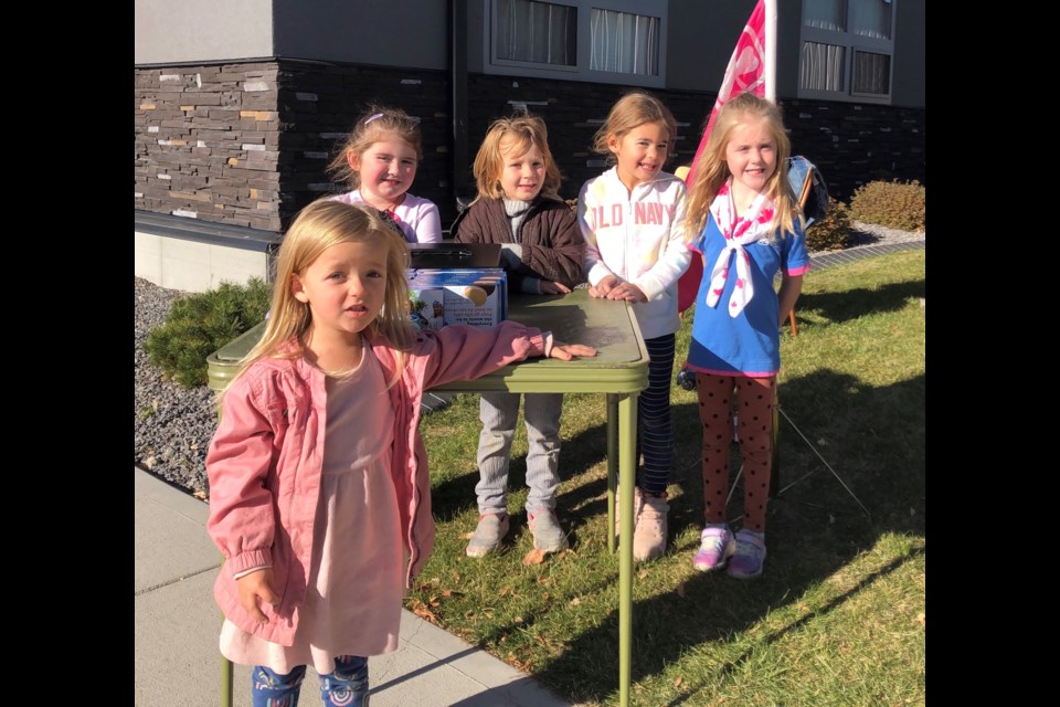 The Luseland Sparks, who are part of the Luseland Guiding Program, sold cookies on Main Street Oct. 16. Pictured here are Stella Starling. Sophia Baier. Clair Angus. Paige Burrows. Demi Reiber.