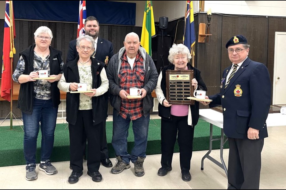The provincial championships of cribbage doubles. Back row, Saskatchewan Command president Nathan Hoffmeister, and front row, from left, Carol Dickie, Lynn Young, Art Prive, Dorothy Knoch and Melville Legion president Mark Matthews. 


