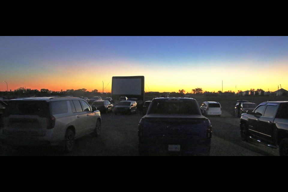 Earlybird families arriving for the drive-in were able to watch the sunset before the movies started up at 7:30 p.m. on the Weyburn fair grounds.