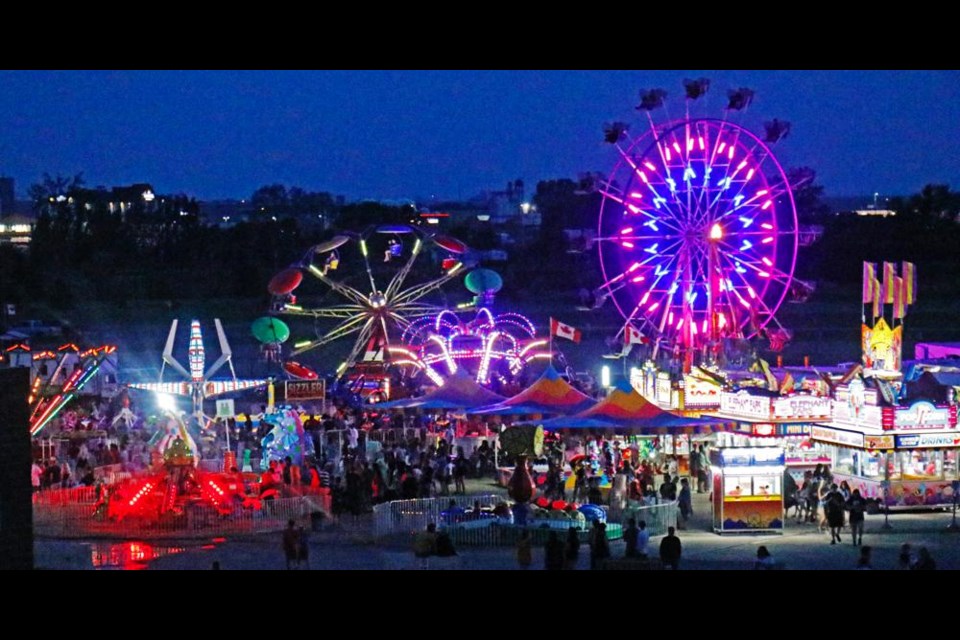 The lights of the midway lit up the fair grounds during the Weyburn Fair, held on July 15-18