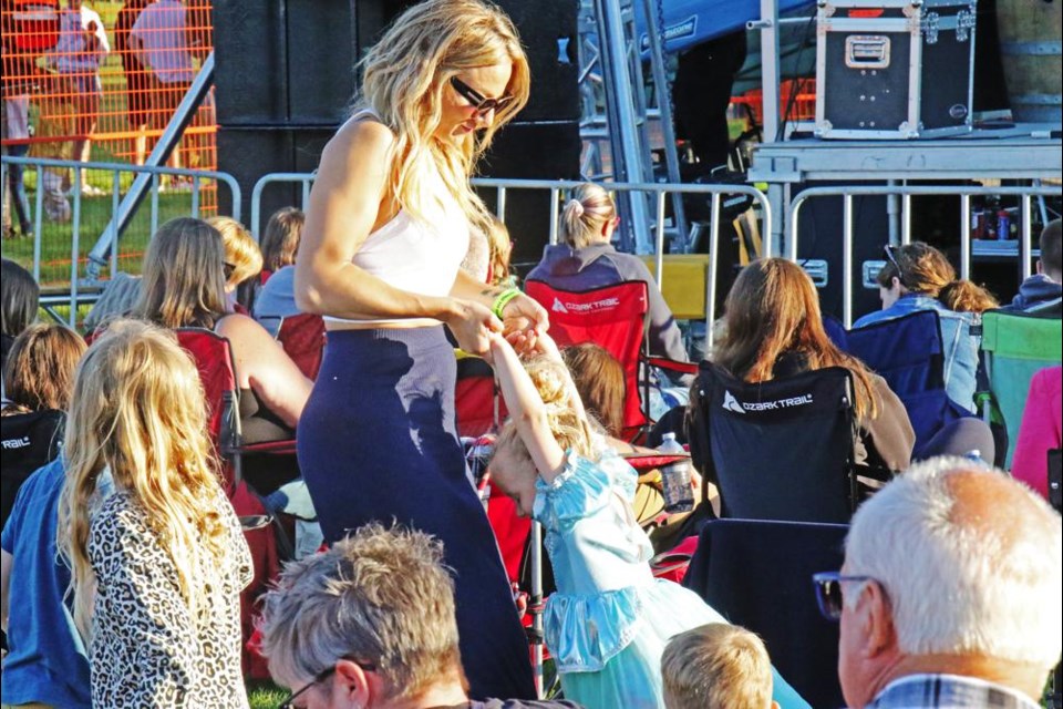 People of all ages got up to dance during the Young Fellows centennial concert on Thursday.