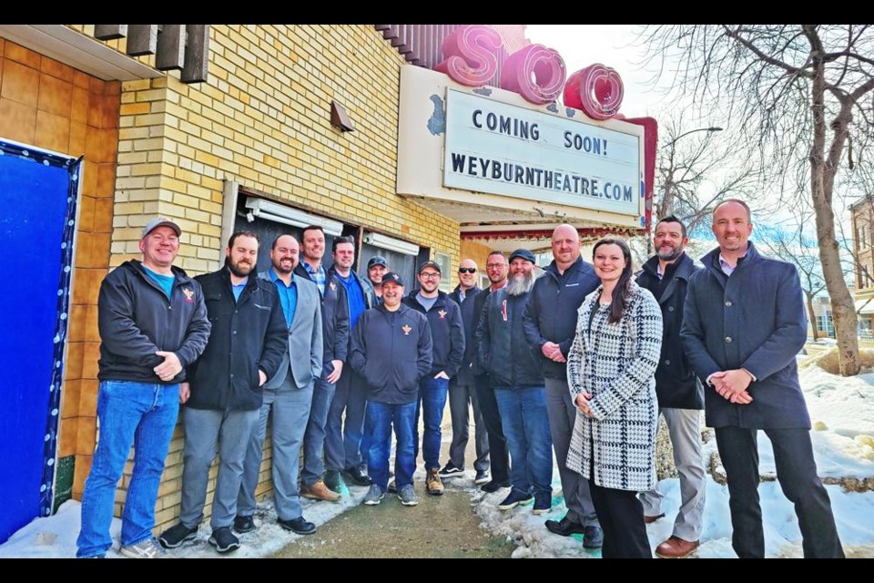 Members of the Young Fellows Club of Weyburn gathered with representatives of the Weyburn Theatre Community Service Co-operative (WTCSC) as the Young Fellows announced a $100,000 sponsorship of the party room at the new two-screen theatre. From left to right are Ray Jarvis (YF); Brett Ferguson (WTCSC); Ryan Bader (YF); Shane Warner (YF); Ryan Janke (WTCSC); Chad Ror (YF); Len Hutchings (YF); Taylor Gonczy (YF); Reed Anderson (YF); Andy Barber (YF); Todd Bedore (YF); Lee Tochor (YF); Laila Bader (WTCSC); Chad Bailey (YF), and Sean Purdue (WTCSC).