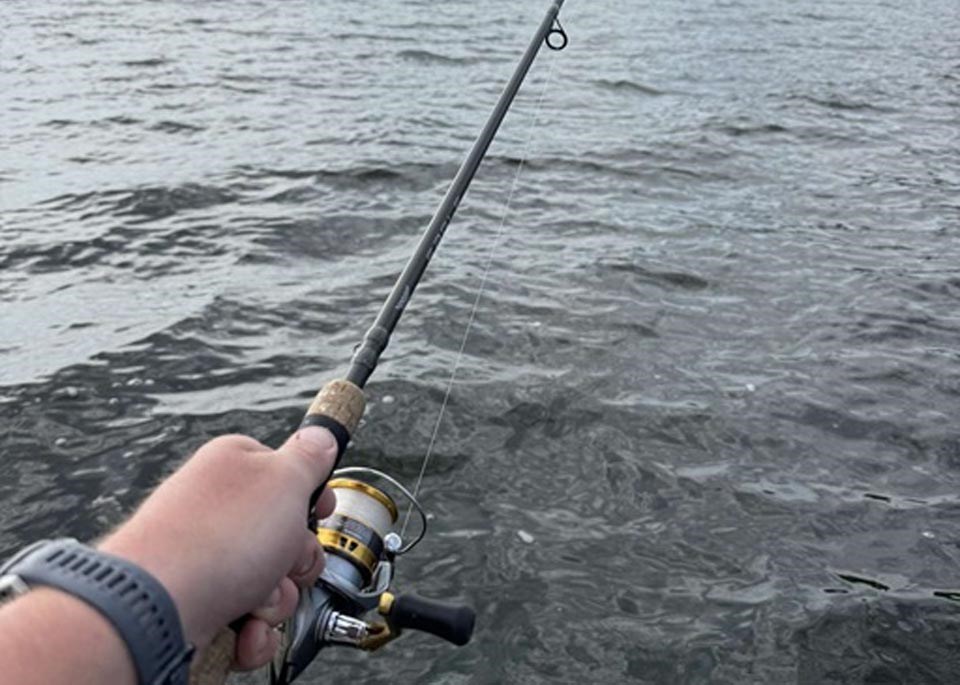 angler-with-rod-on-lake-4787