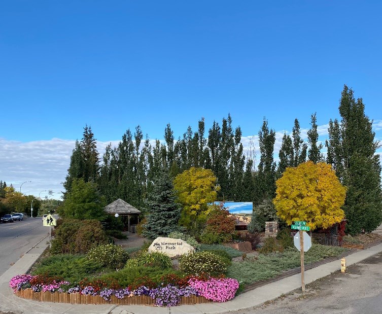 Second Place in the CiB Take a Shot contest. Capturing Memorial Park in Turtleford, selected for its strong sense of place, identified with a beautiful rock sign set in a nice mixture of flowers and shrubs, an interesting walkway to a mural and a well shaded gazebo set in a nice mixture of coniferous and deciduous trees. The pedestrian sign mimics the people that move through the scene contemplating the space.