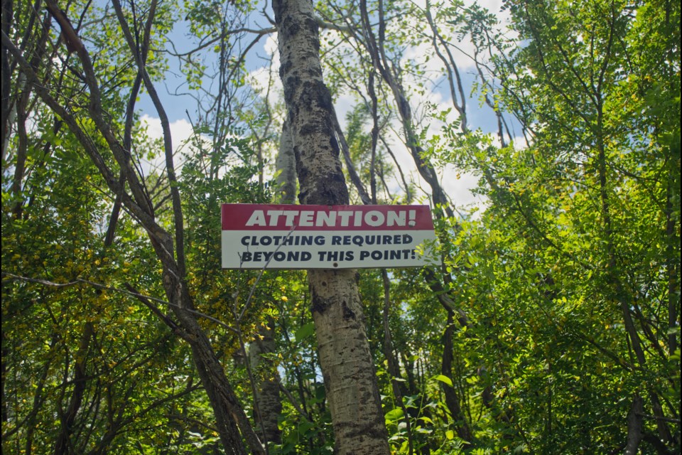 This sign marks the perimeter of the grounds.