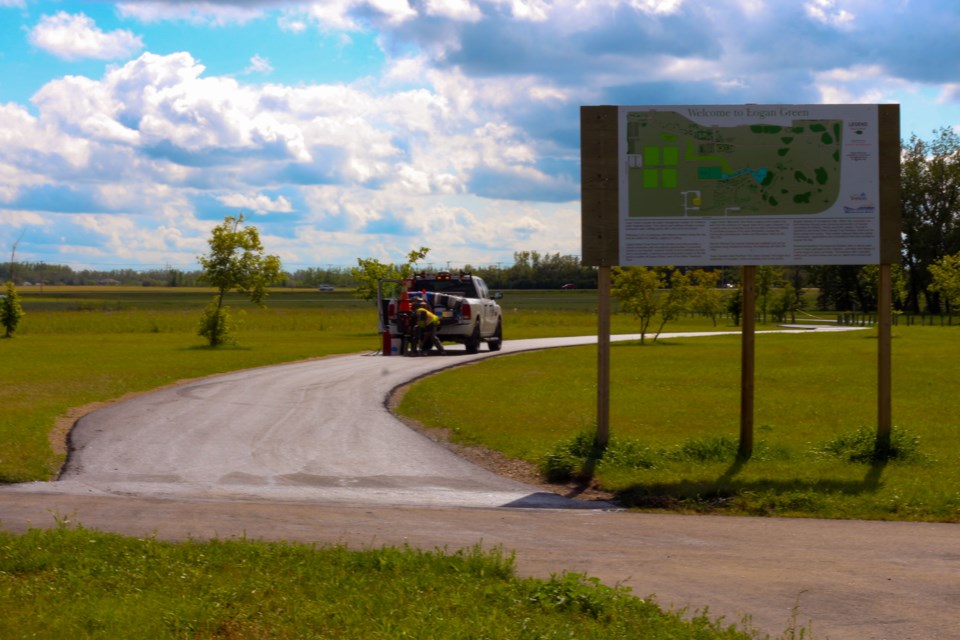 Section of Logan Green path paved