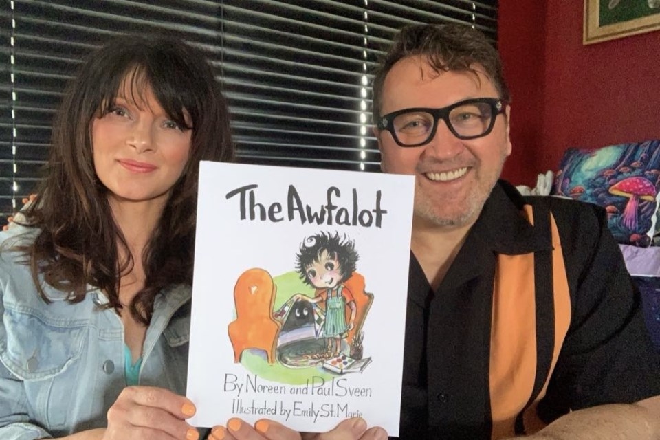 Paul Sveen and his wife Noreen with a copy of the Awfalot.