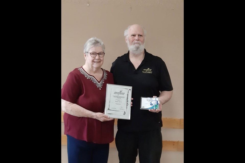 Elaine Sperle, longtime member and volunteer with the Unity Ag. Society, receives a lifetime membership.  Award presented by Glen Duck, secretary for SAASE.