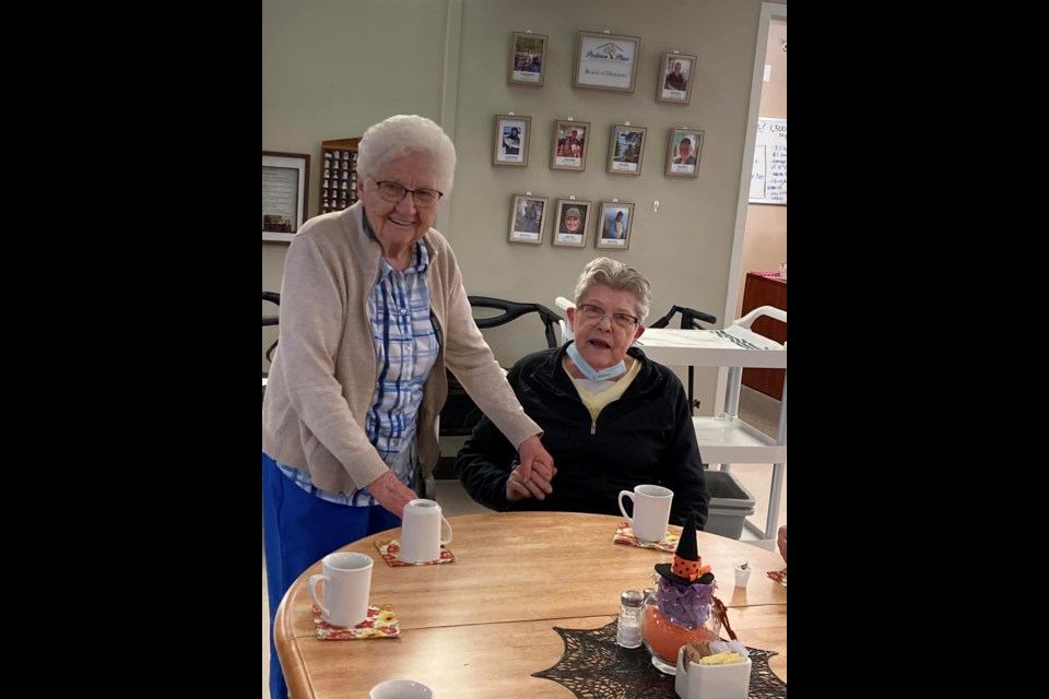 The warm smiles of residents experiencing a cross-town visit evidences the happiness factor in this monthly activity for residents of Parkview Place and Unity's Long-Term Care. Pictured here are Angela Schell, right, and Jean Sopyc.
