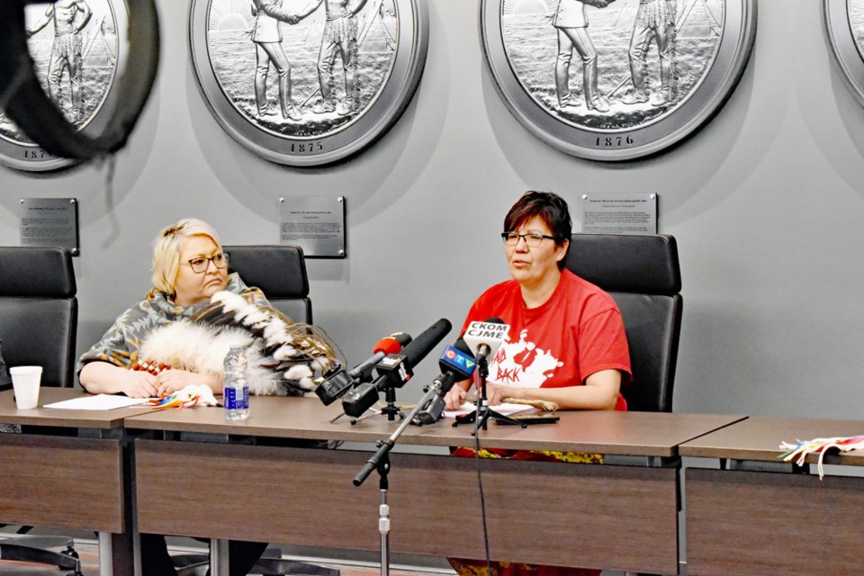 FSIN Fourth Vice Chief Heather Bear, left, listens while Moosomin First Nation Chief Cheryl Kahpeaysewat makes a statement against The Saskatchewan First Act or Bill 88.