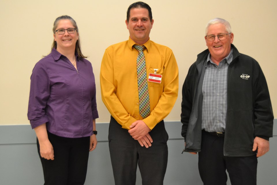 Reporting to the 2023 Gateway Co-op annual information meeting in Sturgis, from left, were: Office Manager Heather Prestie, General Manager Brad Chambers and President Lyle Olson.