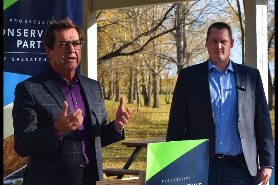 Progressive Conservative Party of Saskatchewan member Dave Bucsis, left, introduces Doug Barr in Friday's press conference at the Lions Park in Warman.