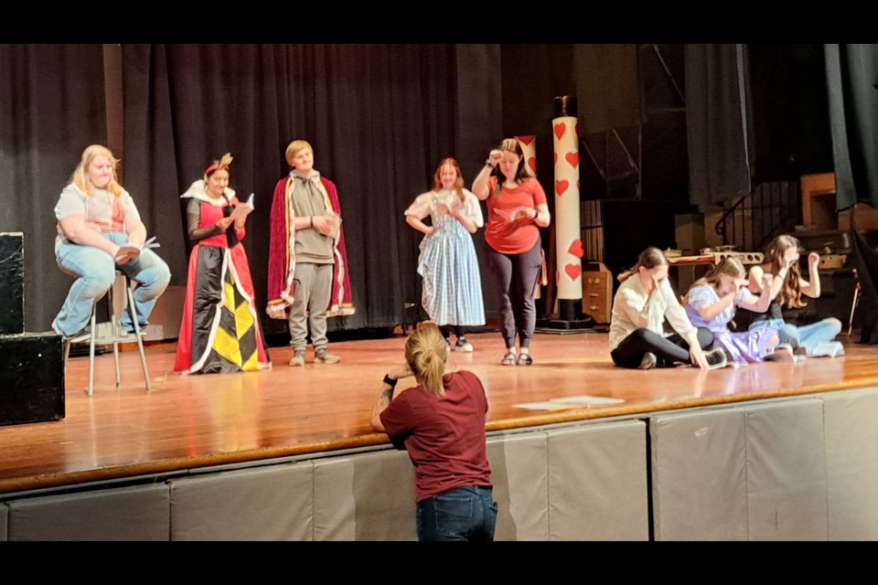 Members of the ACHS drama club were on the stage, working on an upcoming presentation.