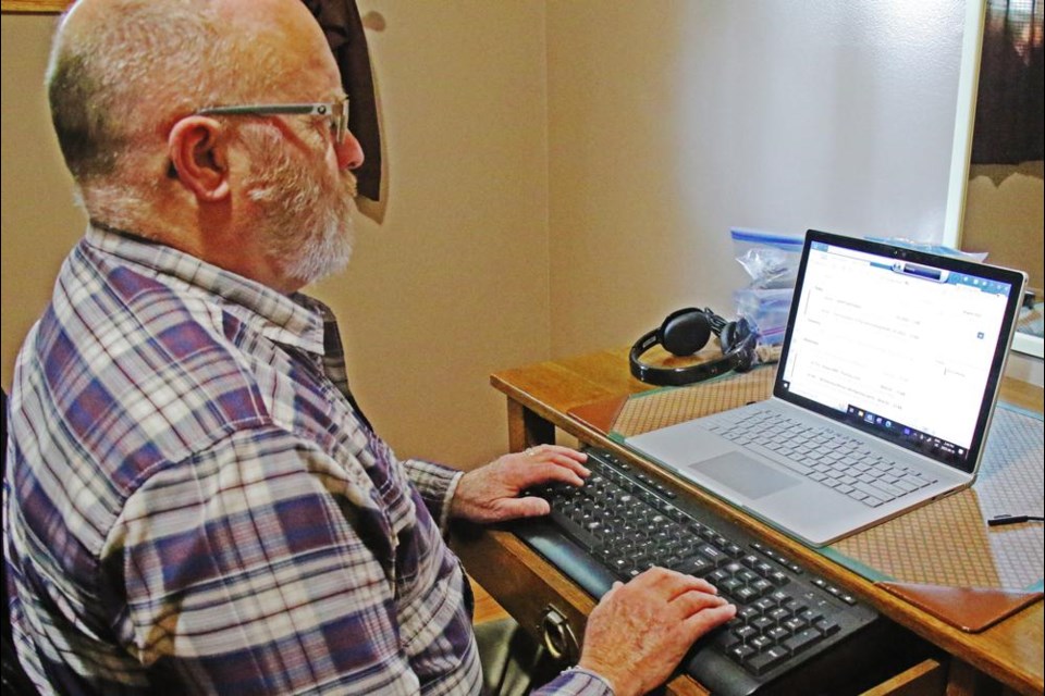 Duane Schultz uses a program called JAWS, which reads text to him from his laptop, which he is able to use to read emails and other posts on the Internet.