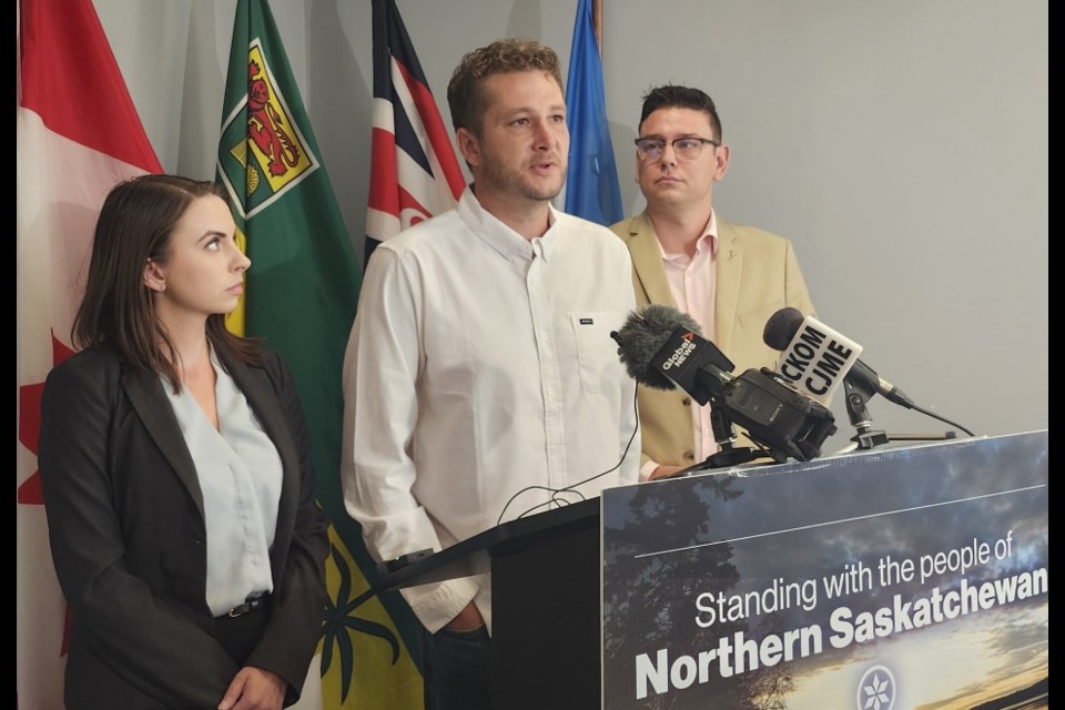 Dustin Trumbley holds back his tears as he recalls their tragic experience in losing their home in the Northern wildfires.