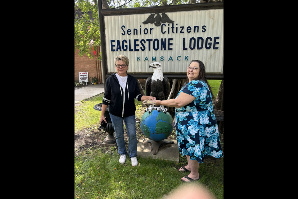 Eaglestone Lodge's fundraising chair, Cindy McGregor (right), took center stage on behalf of the lodge's board as she presented the lucky winner, Rhonda Rosset of Kamsack, with her winnings of $2,500. The prize was awarded as part of a 50/50 raffle draw held on Sept. 3.