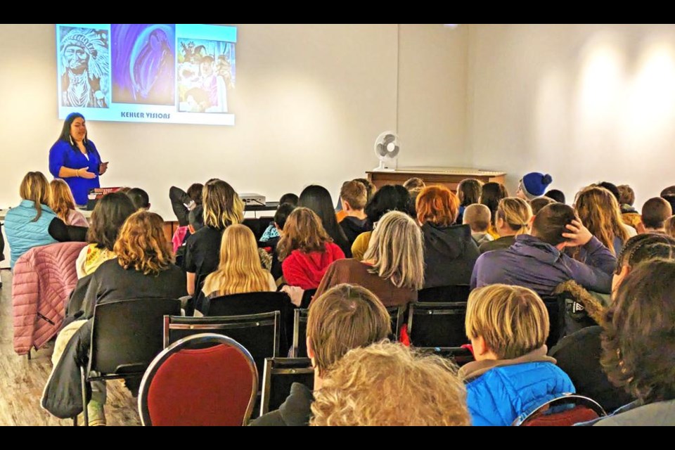 Students from Legacy Park and St. Michael were on hand to hear a presentation by Indigenous artist and activist Danii Kehler on Friday at the Weyburn Public Library.