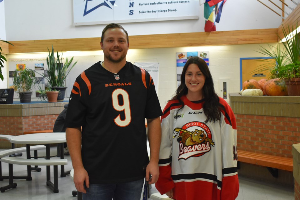 Students and teachers came together at the Kamsack Comprehensive Institute to wear jerseys of their favourite teams on Nov. 8. From left, Vice Principal Kody Rock and Student Counselor Jordyn Staples wore their favourite team’s jerseys.