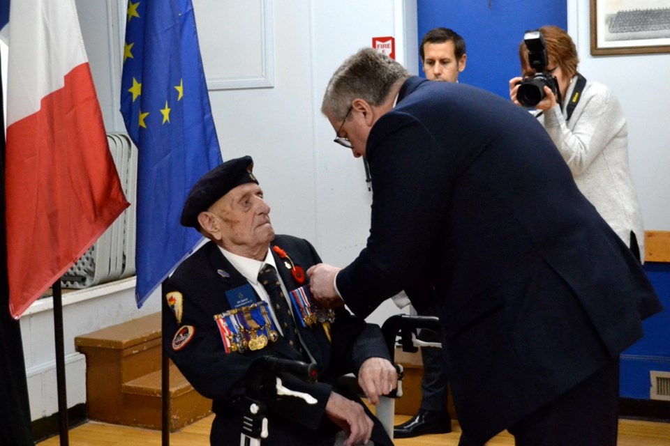 French Ambassador Michel Miraillet presented Second World War veteran Jim Spenst with the Rank of Knight with the National Order of the Legion of Honour in France, the highest French order of merit, both military and civil. 