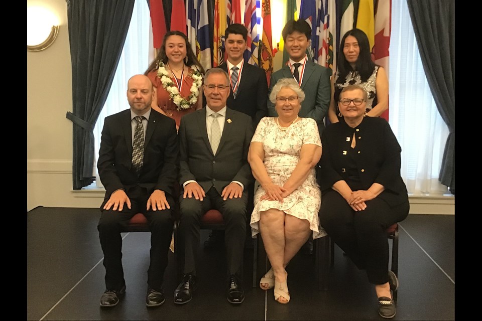 Seen at the 2023 Junior Citizen of the Year awards — back row: Lanea Lafontaine, Victor Santos Cardoza, Winston Zhao, and Dr. Stephanie Young (accepting for Sophia Young); front row, Chris Ashfield of SWNA, Lt. Governor Russ Mirasty, Donna Mirasty, and Minister of Parks, Culture and Sport Laura Ross.
