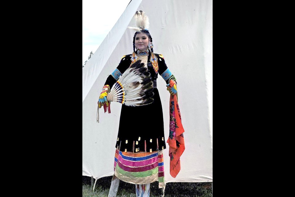 Kakishew Ahenakew stands proudly in full regalia after last month's event at the Doukhobor Dugout House.