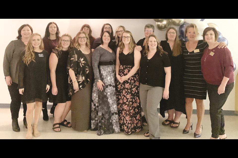 The Kinette Club of Assiniboia members gathered for a 20th anniversary celebration on September 24. In the back row, from left, are Jesse Shkuratoff, Kaitlin Oancia, Cath Sinclair, Lisa Martin, Tracy Nelson, Marni Chadwick, Lorna Menke, Corie Ruzicka-Olson and Lorraine Duxbury. In the front row, from left, are Talsa Warken, Alicia Menke, Raelynn Nicholson, Cecette Brons Rhodes, Amanda Duxbury and Justine Bamford.