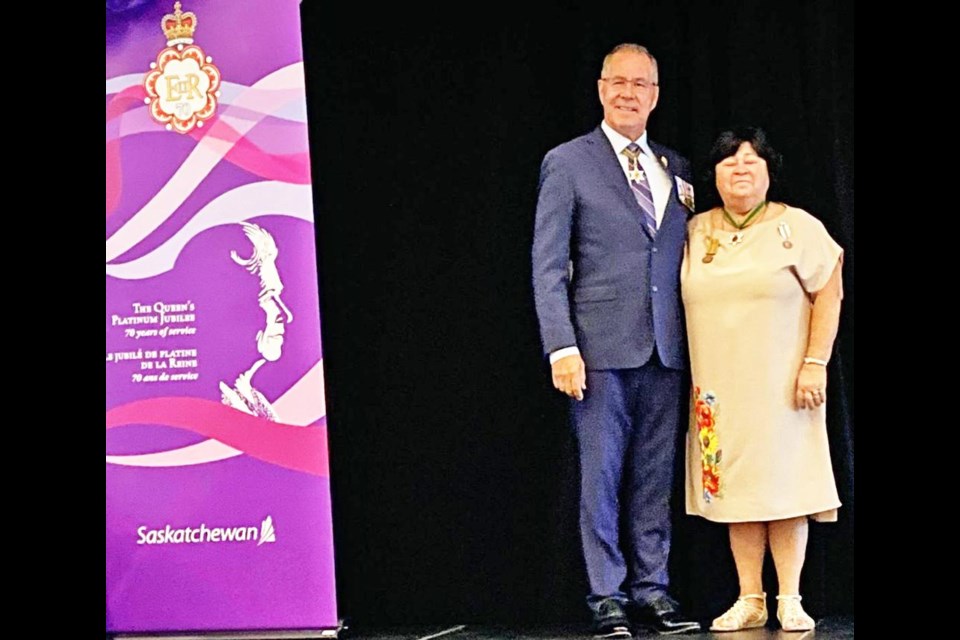 Lt.-Gov. Russ Mirasty presented Linda Rudachyk with the Queen's Platinum Jubilee Medal, as part of the province's first group of 70 recipients on Aug. 30.