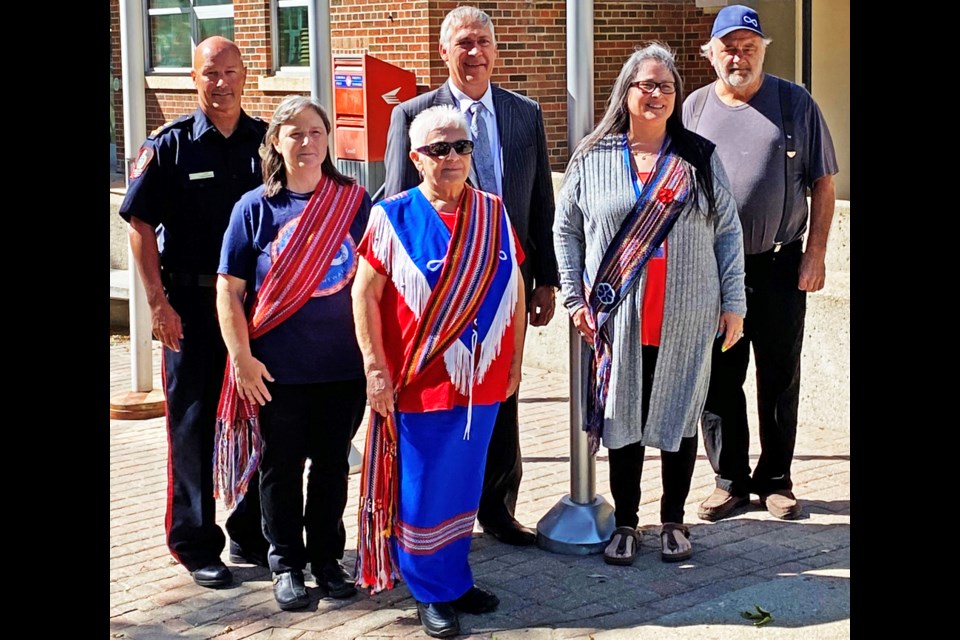 In the back row are Weyburn Police Chief Jamie Blunden; Mayor Marcel Roy; and Don Lafoy, past president of Weyburn Local 87. In front are Dixie Metz, vice-president of Weyburn Local 87; Grace Racette, elder from Indian Head Local 103; and Trisha Nykiforuk-Racette, president of Weyburn Local 87.