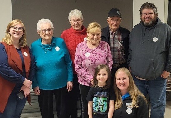 Plus One Club members are, from left, Lois Feaver, Margaret Hauglum, Linda Carlson, Clarence Carlson, Cory Torgunrud, as well as Edna Anderson, Rayna Ferguson and Rebecca Ferguson in the front. 