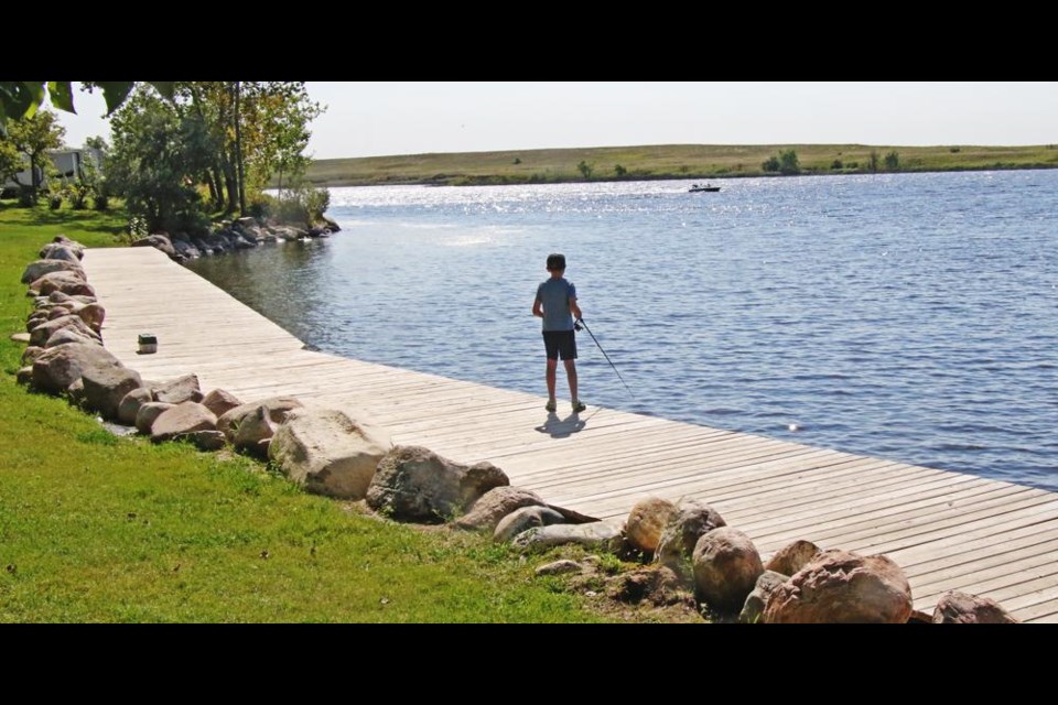 Saturday was a very warm, sunny day a Nickle Lake Regional Park, where people were fishing, boating and playing on the beach.