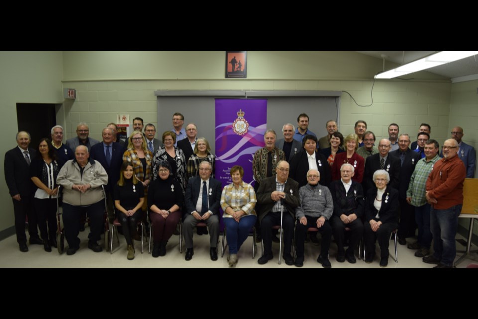 Award recipients from across the Canora-Pelly riding gathered for a photo with Canora-Pelly MLA Terry Dennis and Moose Jaw North MLA Tim McLeod at the Queen Elizabeth II Platimum Jubilee Medal Awards in Canora on Jan. 3. Sylvester Hrynkiw and Terry Wilson were unavailable for the group photo.