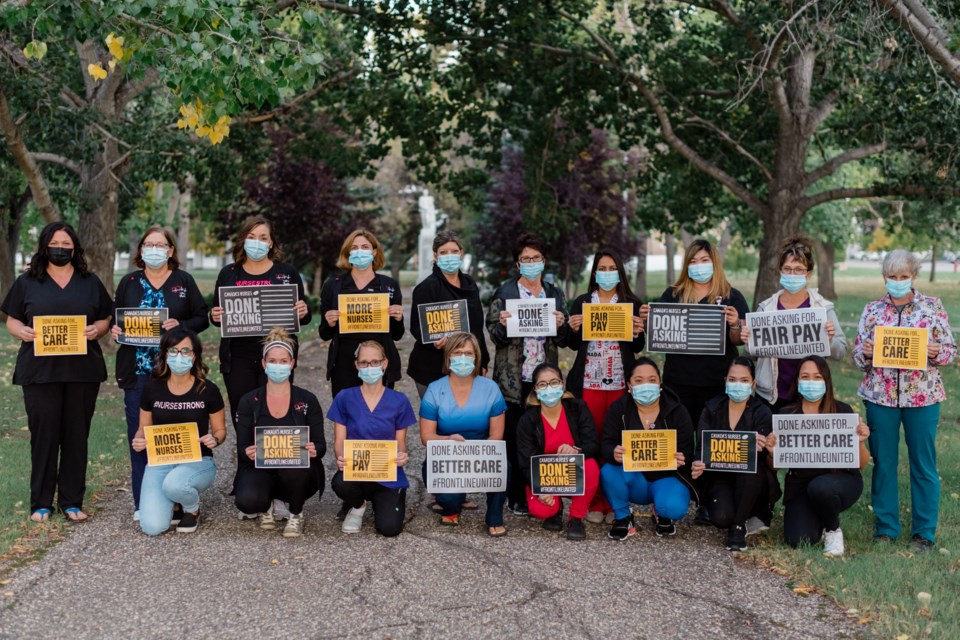 Unity nurses and supportive health care workers stand in solidarity for change.