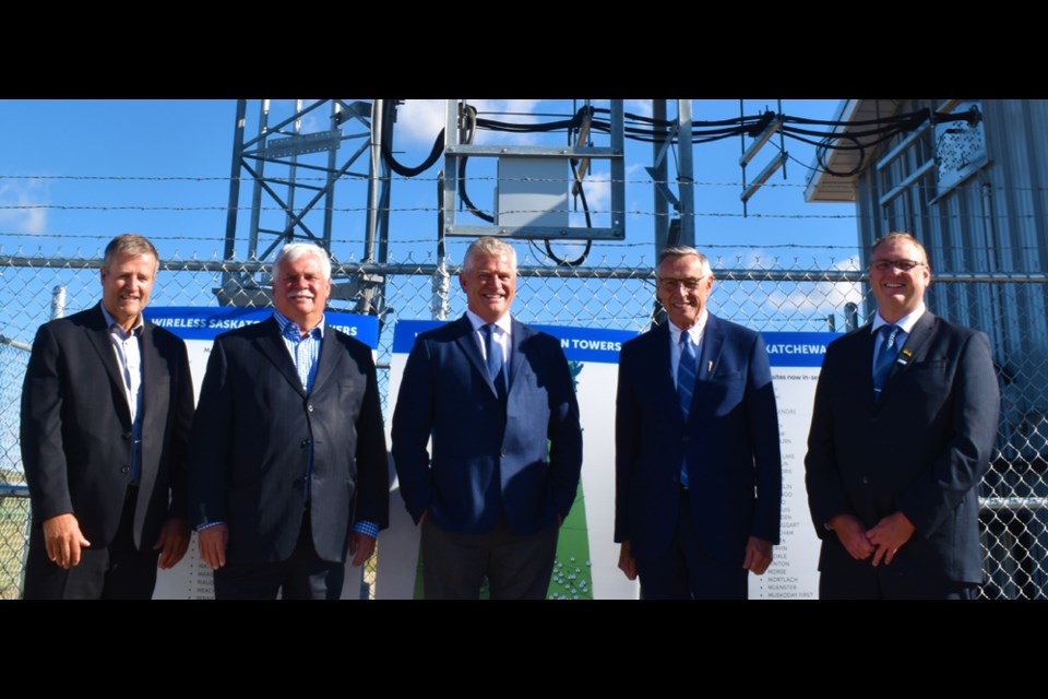 Minister Responsible for SaskTel Don Morgan,  fourth from left, joins Legislative Secretary David Buckingham, from let, Legislative Assembly Speaker Randy Weekes, SaskTel president and chief executive officer Doug Burnett, and Borden Mayor Jamie Brandrick in Friday's media conference on SaskTel's Wireless Saskatchewan initiative.