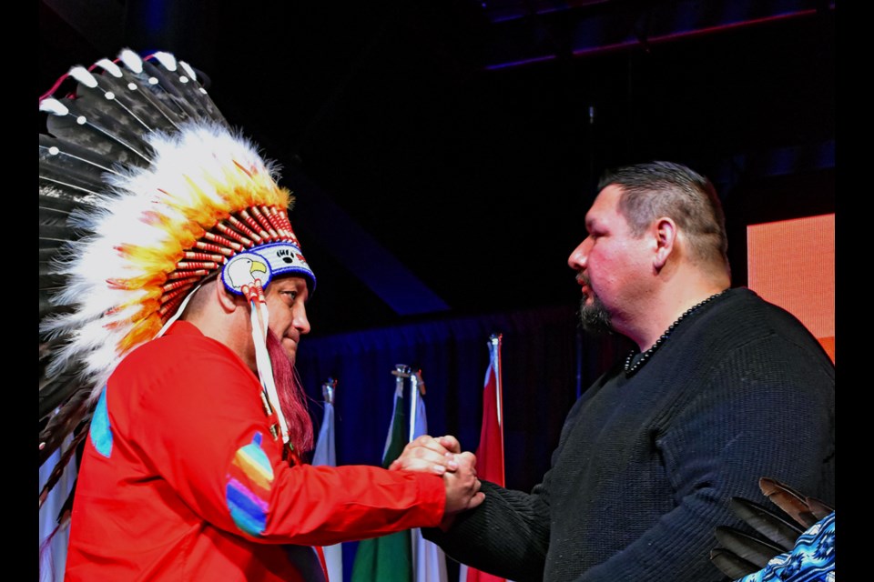 Saskatoon Tribal Council Chief Mark Arcand, left, gets a congratulatory greeting from Muskeg Lake Cree Nation Chief Kelly Wolfe during the fundraising gala last Jan. 19.