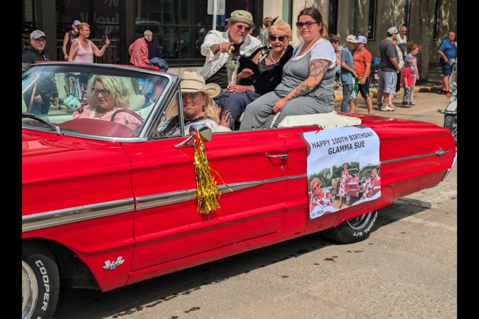 "Glamma Sue", or Susan Mailhiot, is celebrating her 100th birthday this weekend, and this was her enjoying her moment in the Weyburn parade in a convertible, making note of her 100th birthday to come.
