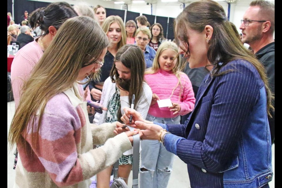 Fans wanted to meet Tessa Virtue and many sought her autograph, or a photo with her.
