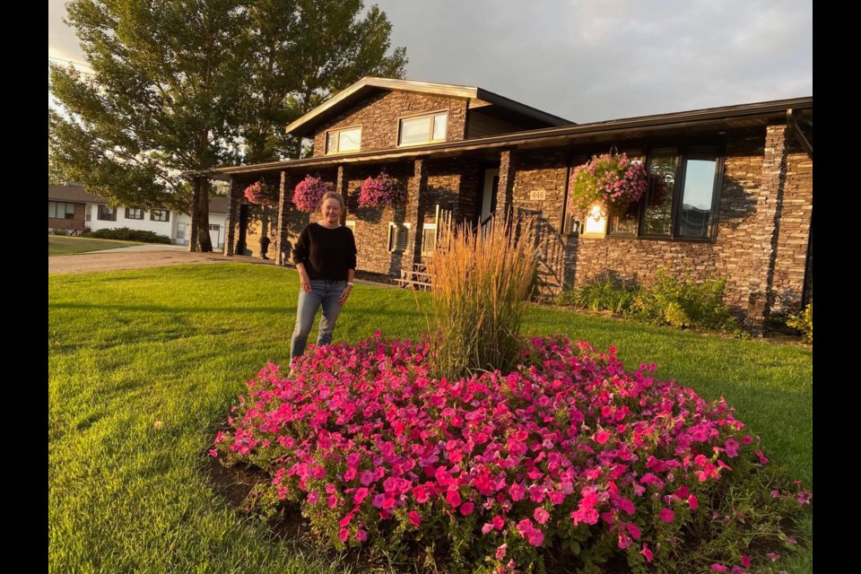 2021 Kerrobert Communities in Bloom winner for most deserving yard were Brad and Tracy Heidt, with Tracy shown here.