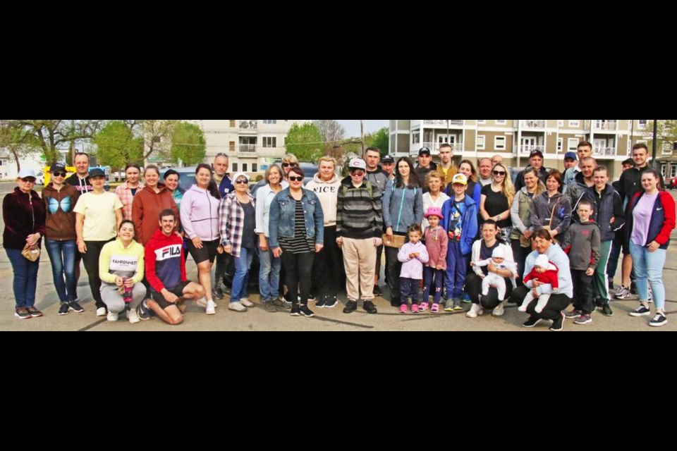 This group of Ukrainian families gathered on Monday morning to do a cleanup around Weyburn, as a way to give back to the community that has helped them make a new start.