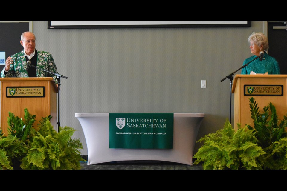 Ron Graham, left, speaks while his wife Jane listens during Friday's announcement that they will be donating $5.9 million to the University of Saskatchewan with $3 million going to the Huskies' athletics program.