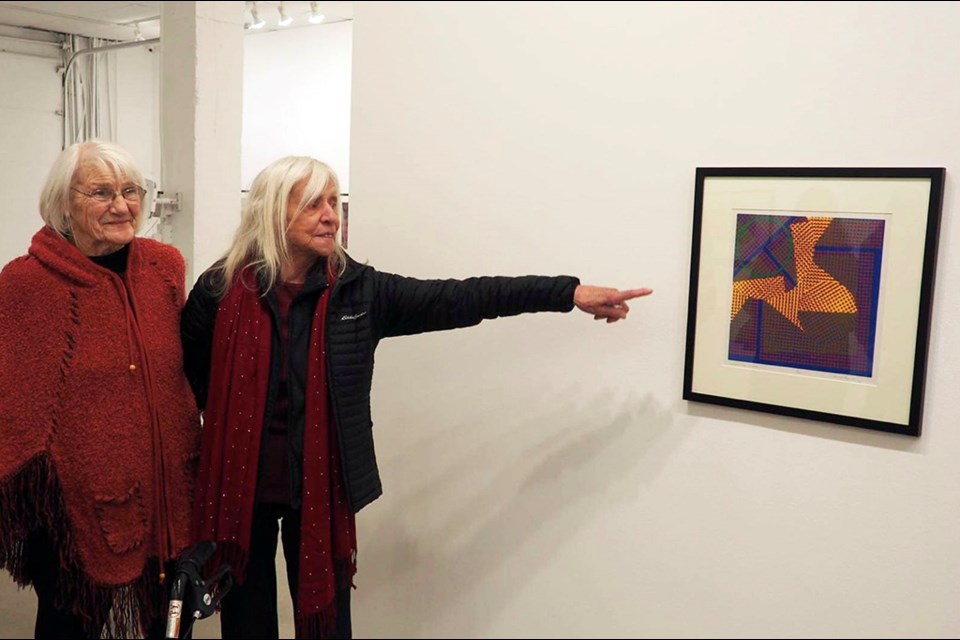 Katie Ohe while Velma Foster looks on at their show in Calgary.