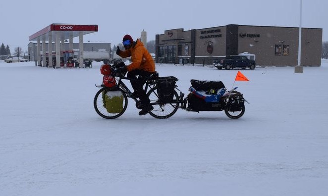 It’s not too often a person might see a cyclist in Canora as the snow falls in late January, but Jean-Pierre Tremblay of Montreal is no ordinary biker. To celebrate Canadian winter, and because he enjoys a challenge, Tremblay is cycling from Montreal to the Artic Ocean near Tuktoyaktuk, Northwest Territories. He passed through Canora on January 31 after spending the night in Kamsack. / Rocky Neufeld