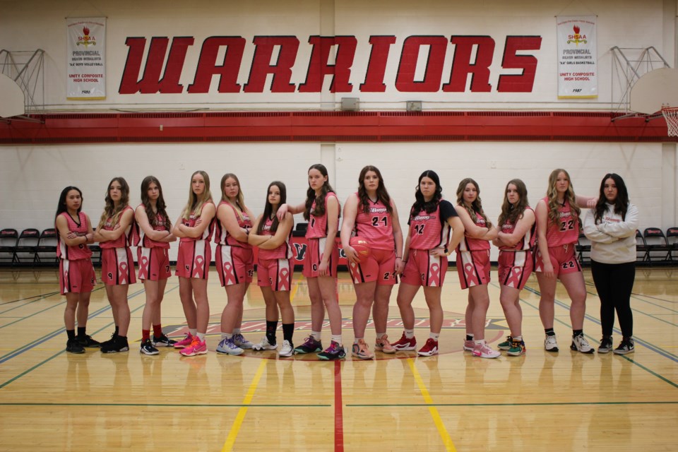 The 2023-24 senior girls' basketball team at Unity Composite High School gear up for the annual Pink Tournament.
