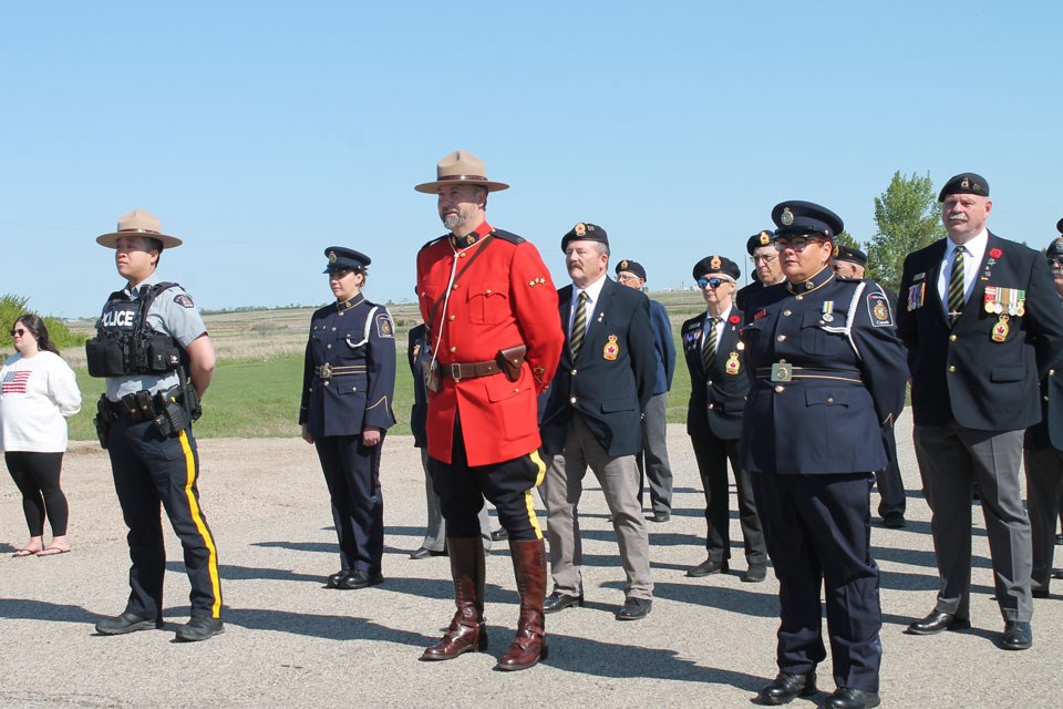 Derek Dyck of Carnduff’s RCMP (centre), leading the Canadian contingent towards the border to meet the Americans. .