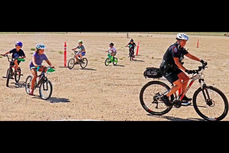 Const. Melinda Mintenko led a group of riders on a skills course at the last bike rodeo, and she is organizing this year's rodeo set for Jubilee Park on June 29