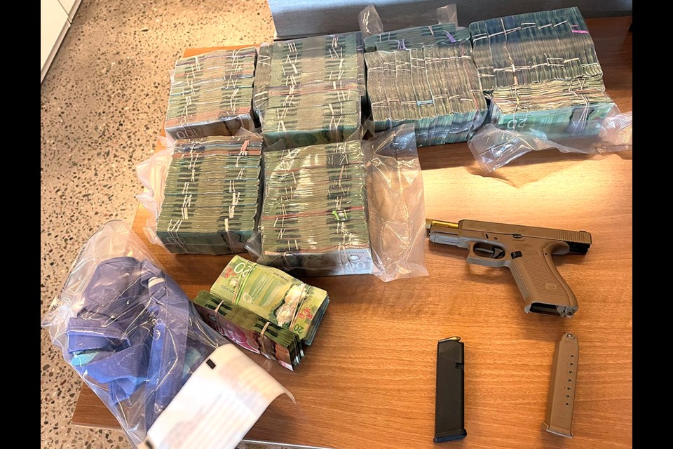 Large quantity of Canadian currency, a restricted firearm and ammunition were seized May 31.

 