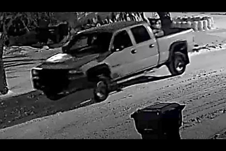 At precisely 2:03 a.m. on Jan. 8, a light coloured Chevrolet Silverado quad cab truck (1999-2006) was caught on surveillance camera driving slowly.