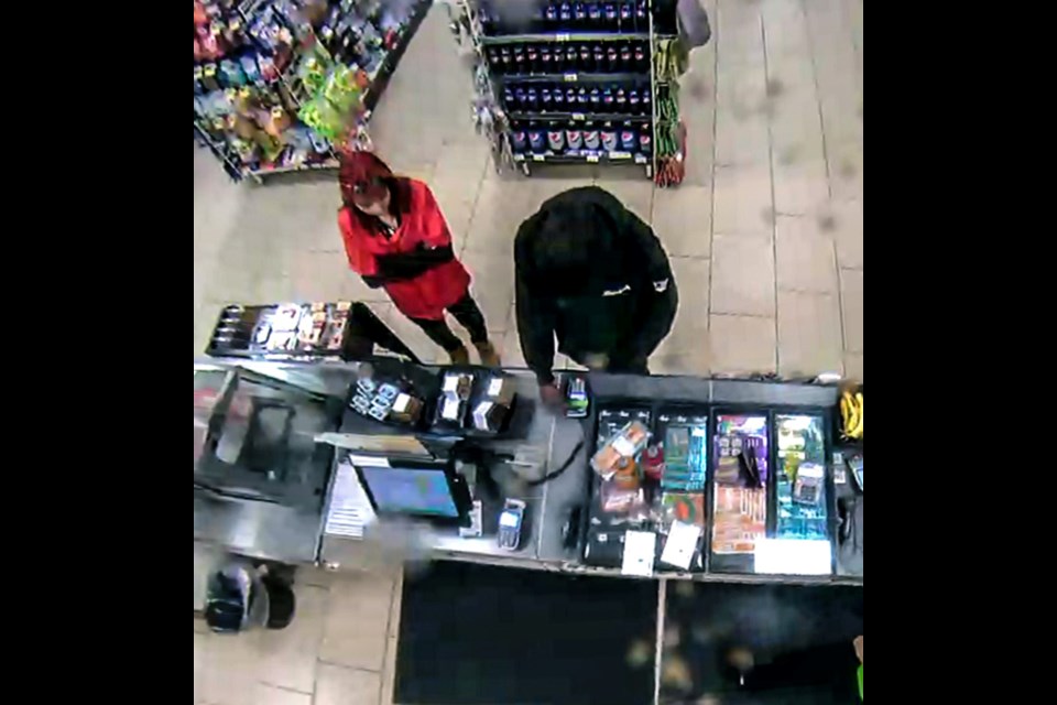 Martensville RCMP are requesting assistance to identify this male and female in relation to a theft from a vehicle and fraudulent use of a bank card.